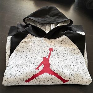 Jordan Speckled Black and White Hoodie with Red Logo